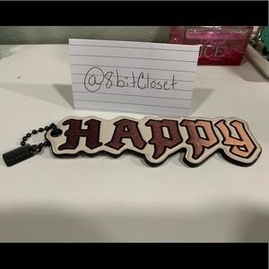 Coach x Disney “Happy” keychain/charm